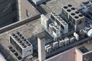 13749077-Exhaust-vents-of-industrial-air-conditioning-and-ventilation-units-Skyscraper-roof-top-in-Tokyo-Japa-Stock-Photo